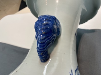 A Chinese blue, white and copper red vase with elephant handles, 19th C.
